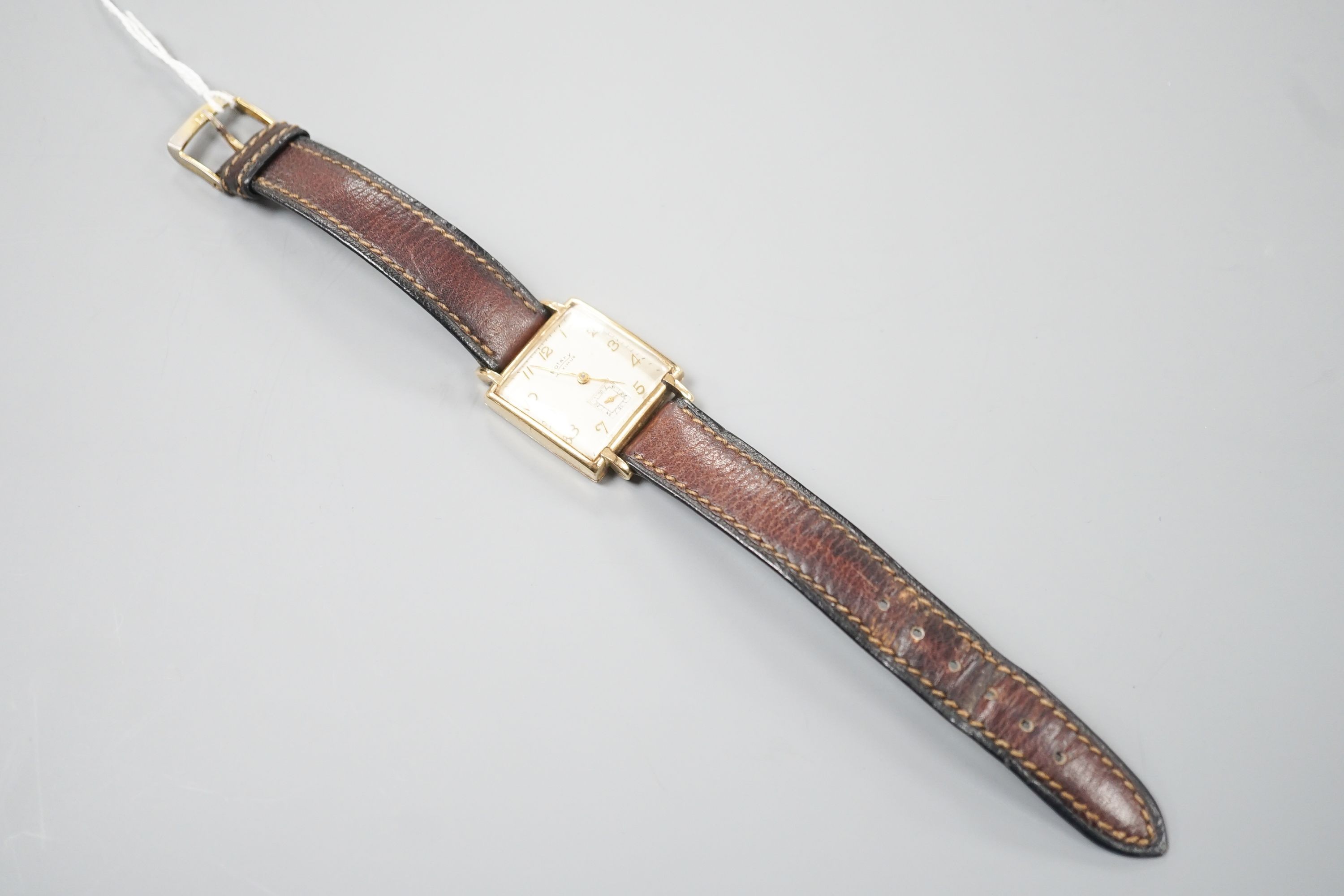 A gentleman's late 1940's 9ct gold Rotary Maximus manual wind wrist watch, on a leather strap, cased diameter 25mm, gross 23.3 grams (a.f.)